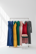 Stylish women's dresses in various colors on a white background