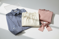 Stylish women's tops and blouses on a clean white background